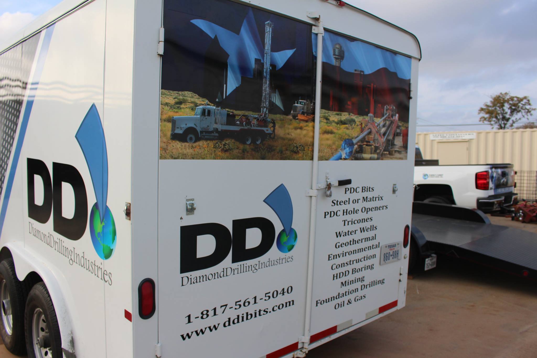 DDI Trailer Wrap Back Design - Call-to-action and contact information for traffic visibility